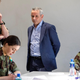 File photo of the CEO of Ireland’s Health Service Executive (HSE) Paul Reid (center) and Chief of Staff of Ireland’s Defense Forces, Vice Admiral Mark Mellett (left) with Irish Army cadets on March 13, 2020.